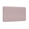 Dusty pink upholstered fabric headboard with textured linen-like finish and rounded corners