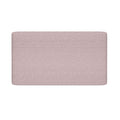 Light pink upholstered headboard with textured fabric and rounded top corners on white background