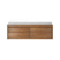 Modern natural wood dresser with drawers topped by a white mattress pad, isolated on a white background