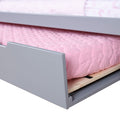 Grey wooden trundle bed with pink quilted mattress and butterfly sheet, pull-out storage bed for children's bedroom