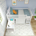 White loft bed with built-in desk and drawers in coastal-themed kids bedroom, teal bedding and orange pillow, ladder and ocean wall art