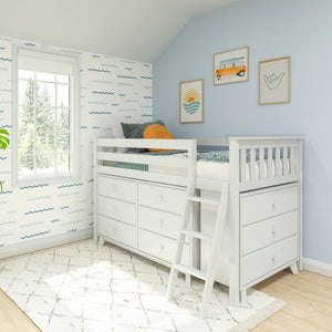 White loft bed with built-in drawers and ladder in a coastal-themed kids’ bedroom featuring blue wave wallpaper, surf prints, and natural window light
