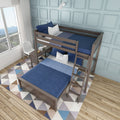 Modern wooden twin-over-full bunk bed with navy blue bedding, light-blue paneled accent wall, geometric rug and sunlit window in a kids' bedroom