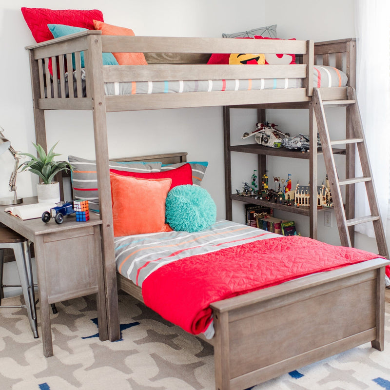 Gray wooden loft bunk bed with ladder, colorful striped bedding and red quilt, accent throw pillows, toys and LEGO models on shelves in a modern kids' bedroom.