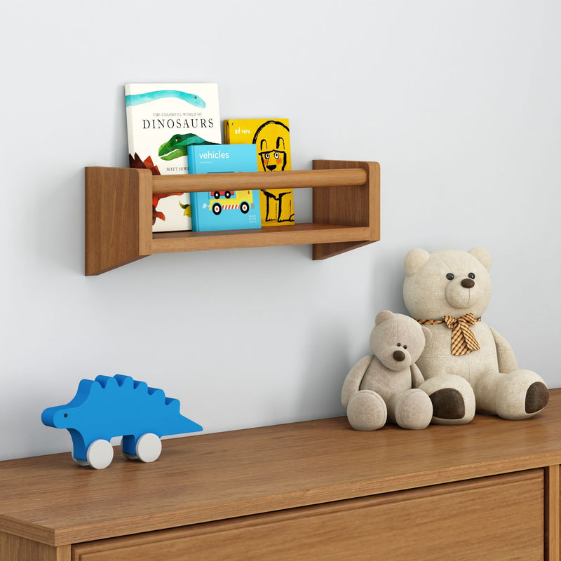 Children's room decor featuring a wooden shelf with colorful books, soft teddy bears, and a playful blue dinosaur toy.