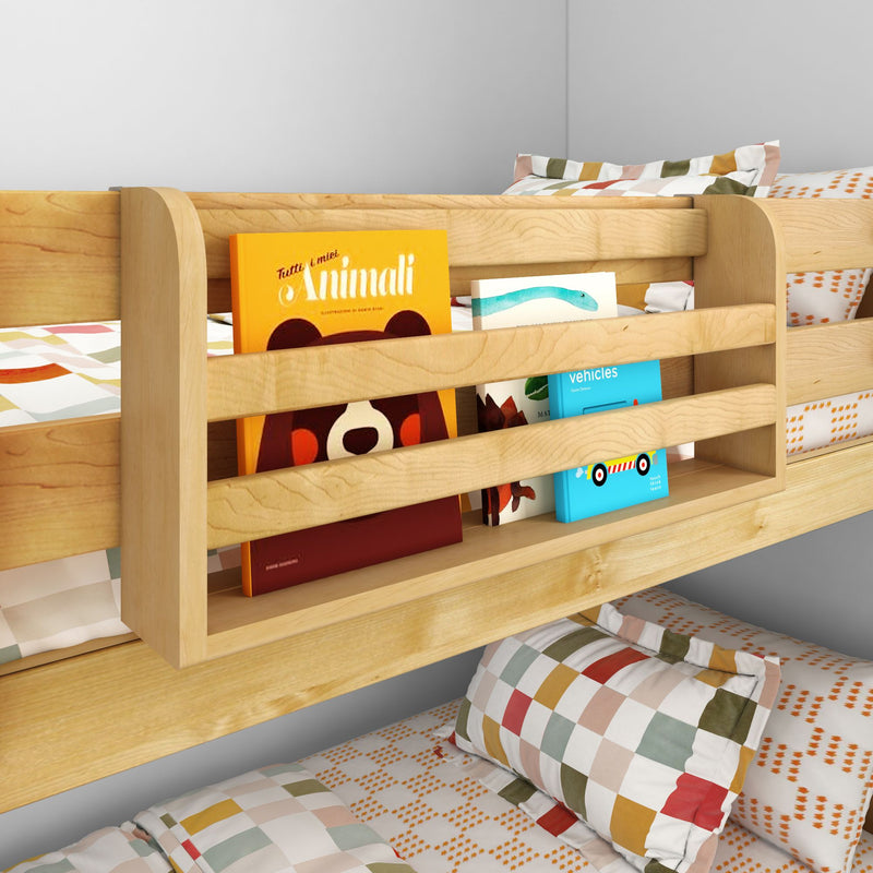 Wooden kids bunk bed with built-in bookshelf holding colorful board books and patterned pillows, modern space-saving kids' bedroom storage