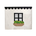 Decorative black and white awning with flower box and window pattern for home decor.