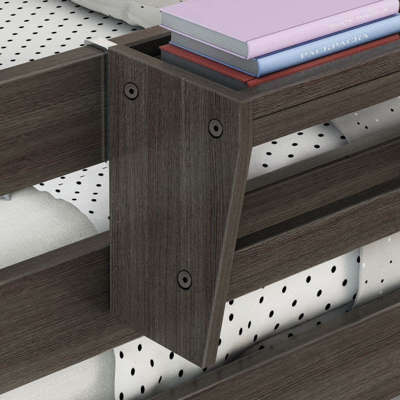 Close-up of dark wood bunk bed ladder and built-in shelf with stacked books and black polka-dot bedding in modern bedroom