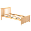 Wooden platform bed frame with slatted headboard, center support rails and light natural wood finish