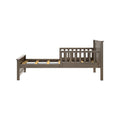 Gray-washed wooden toddler daybed frame with slatted headboard, side rails, and platform slats