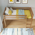 Top view of wooden kids loft bed with yellow bedding, patterned throw blanket, decorative pillows and framed animal wall art in a modern nursery