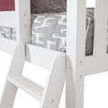 Close-up of white wooden bunk bed ladder and guardrail with grey giraffe-print fitted sheet for kids' bedroom
