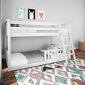 White wooden children's bunk bed with ladder, polka-dot bedding, animal wall art and colorful geometric rug