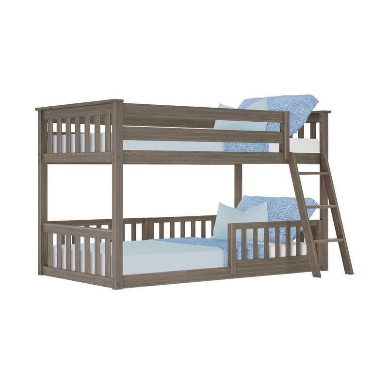 Weathered gray wooden twin-over-full bunk bed with ladder, slatted rails and blue bedding, space-saving kids bedroom furniture