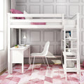 White loft bed with ladder and built-in desk, modern space-saving kids' bedroom with white chair, pink geometric rug, pink pillows, paneled gray wall and natural light