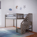 Gray wooden loft bunk bed with stairs in a children's bedroom featuring white shiplap walls, moon and star wall decor, blue polka-dot cloud cushion and striped area rug