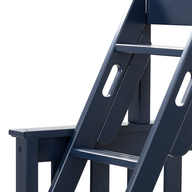 Close-up of navy blue wooden Adirondack chair showing slatted seat, armrest and angled back detail — outdoor patio furniture image