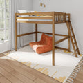 Modern wooden loft bed with ladder and cozy orange lounge chair underneath in a bright minimalist bedroom with white curtains, patterned rug, and natural wood flooring
