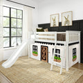 White wooden children's loft bed with slide and ladder and playhouse curtain underneath, farmhouse-style nursery with bunny wall art, large window and jute rug