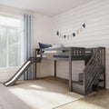 Kids loft bed with slide, gray wooden bunk, navy and pastel bunting on white shiplap wall, light blue curtains