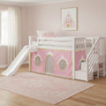 White wooden princess loft bed with slide and stair storage, pink castle play tent skirt, crown pillow and pink rug in girls bedroom