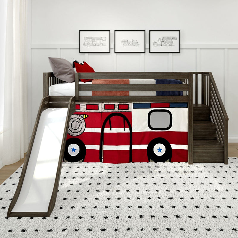 Wooden kids loft bed with slide and stairs featuring a red fire truck play curtain, white dotted rug, and framed fire truck prints in a modern toddler bedroom