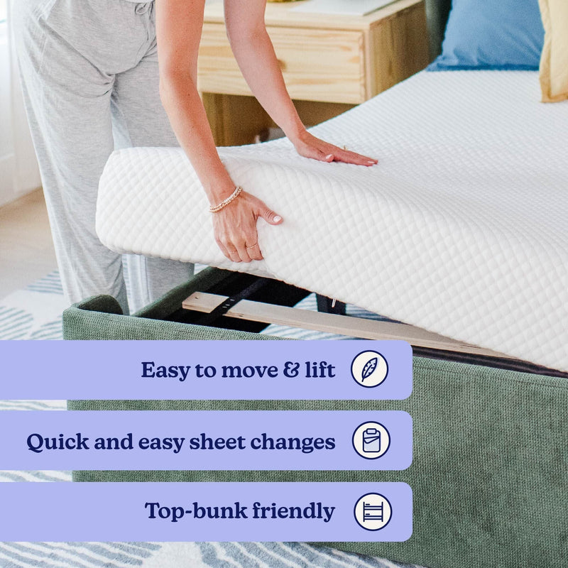 Quilted lightweight mattress topper being lifted on a green bed frame — easy to move, quick sheet changes, top-bunk friendly.