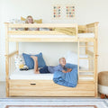 Light wood kids bunk bed with ladder and under-bed storage drawer, two children on top and bottom bunks with blue bedding, pillows and toy truck in bright children's bedroom