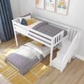 White loft bunk bed with stairs in modern kids bedroom, grey quilted bedding, yellow accent pillows and blue letter-A cushion, rainbow "Let’s Play" wall art, hardwood floor and yellow striped rug