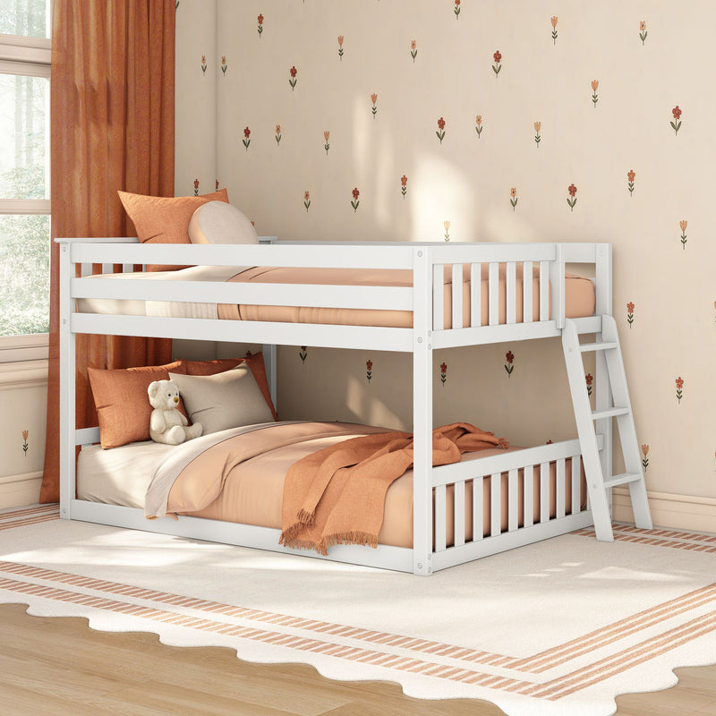 White wooden bunk bed with peach-orange bedding and pillows in a cozy children's bedroom featuring small floral wallpaper decals, rust curtains, and a teddy bear
