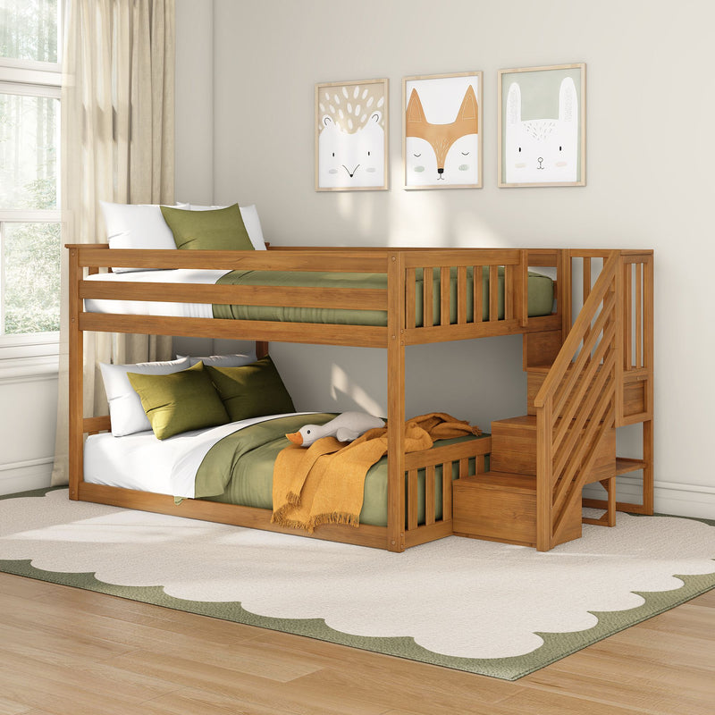 Sunlit Scandinavian kids bedroom with wooden bunk bed and stairs, olive-green bedding, mustard throw and framed woodland animal prints