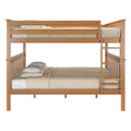 Twin-over-full oak bunk bed with ladder, slatted guardrails and beige textured bedding — natural wood loft bed for kids and guest rooms
