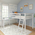 White loft bed with ladder and built-in desk in a coastal kids' room with blue wave wallpaper, framed surf-van art and sunny window