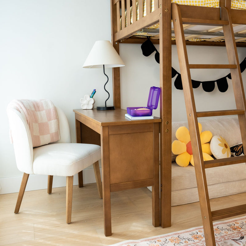 Cozy children's bedroom with wooden loft bunk bed, study desk and lamp, plush flower pillow and purple lunchbox