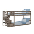Rustic gray wooden bunk bed with built-in staircase, twin-over-full layout and light blue bedding
