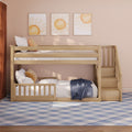 Children's natural wood bunk bed with stairs in a pastel pink nursery, sun-themed wall art triptych, cozy pillows and blue plaid rug