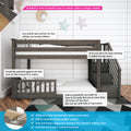 Kids loft bunk bed with staircase and removable safety guardrail, dark gray solid pine low-profile design against white shiplap wall with star and moon decor, includes slats, metal support bar and built-in staircase storage