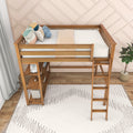 Wooden loft bed with ladder, built-in shelves and colorful pillows against a blush geometric accent wall in a modern kids' room