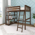 Dark wood twin loft bed with ladder and built-in bookshelf in modern kids' bedroom with light blue geometric accent wall, white rug and city-view window