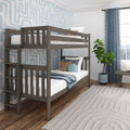 Gray wood twin bunk bed in modern kids' bedroom with blue geometric wallpaper, blue curtains, textured rug and potted plant