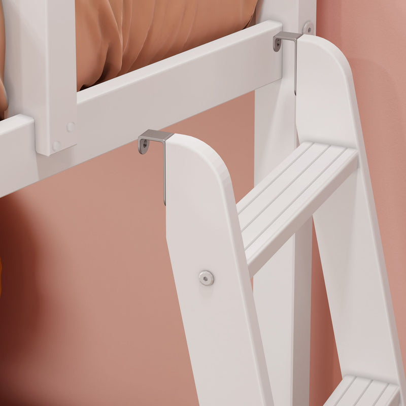 Close-up of a white folding wall-mounted step stool with metal brackets mounted on a peach wall, space-saving modern bathroom ladder