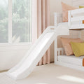 White wooden bunk bed with built-in slide in a bright kids' bedroom with pink curtains, pastel pillows and large window, modern children's loft bed design