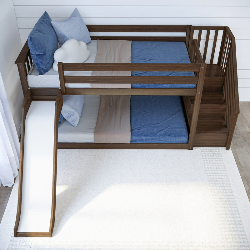 Wooden kids loft bunk bed with slide, twin blue bedding, cloud pillow and built-in stairs against white shiplap wall