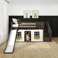 Modern kids loft bed with slide and dark wood frame, playhouse curtain front, neutral nursery decor and framed bunny wall art