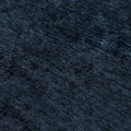 Close-up navy blue plush velvet fabric texture for luxury upholstery, rug and interior design background