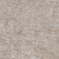 Beige textured carpet close-up with subtle geometric pattern and soft plush pile for living room flooring