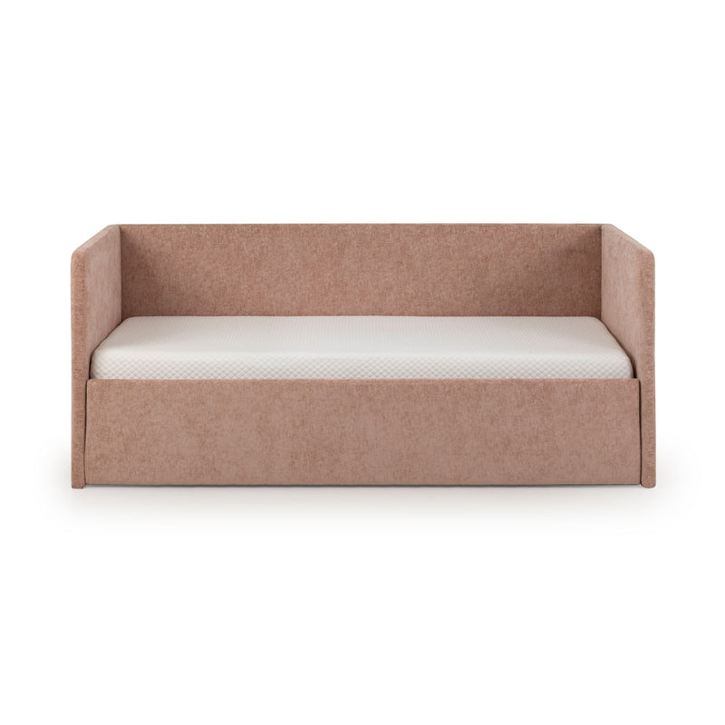 Blush pink upholstered daybed with high back and side panels and white mattress, modern fabric daybed isolated on white background