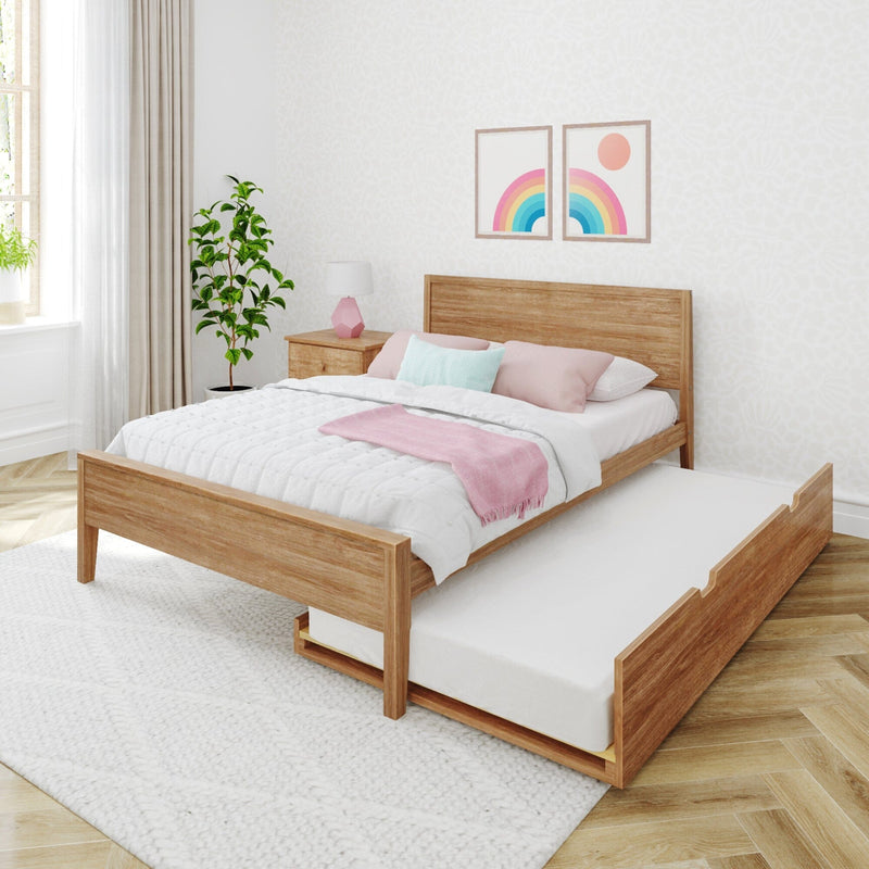 Scandinavian bedroom with wooden platform bed and pull-out trundle, pastel pink and mint bedding, rainbow wall art, bedside lamp and indoor plant