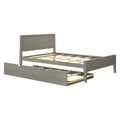 Gray wood platform bed frame with headboard, slatted mattress support and pull-out under-bed storage trundle drawer, modern farmhouse bedroom furniture