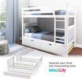 White wooden convertible bunk bed with ladder and pull-out trundle drawer, blue-gray bedding in a modern kids' bedroom